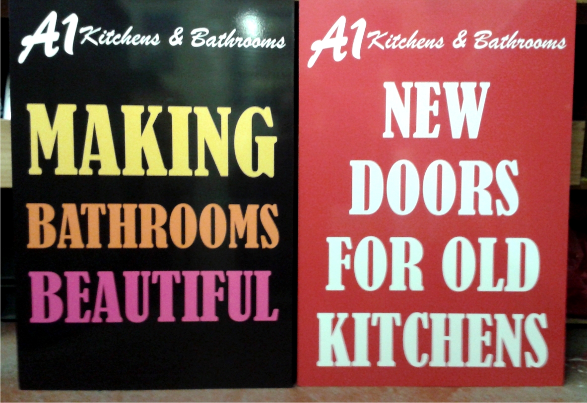A1 Kitchens 7 Bathrooms promo signs