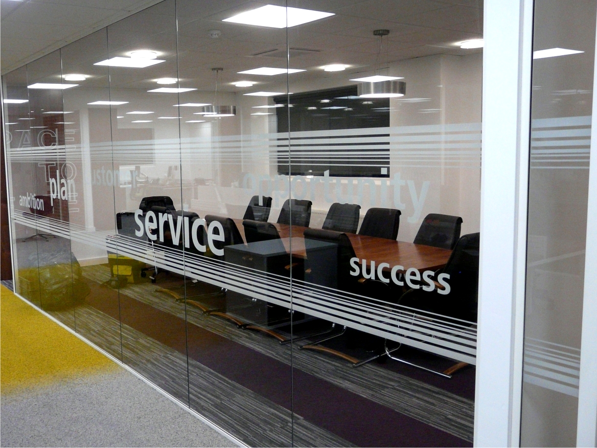 Glass partitions with vinyl graphics